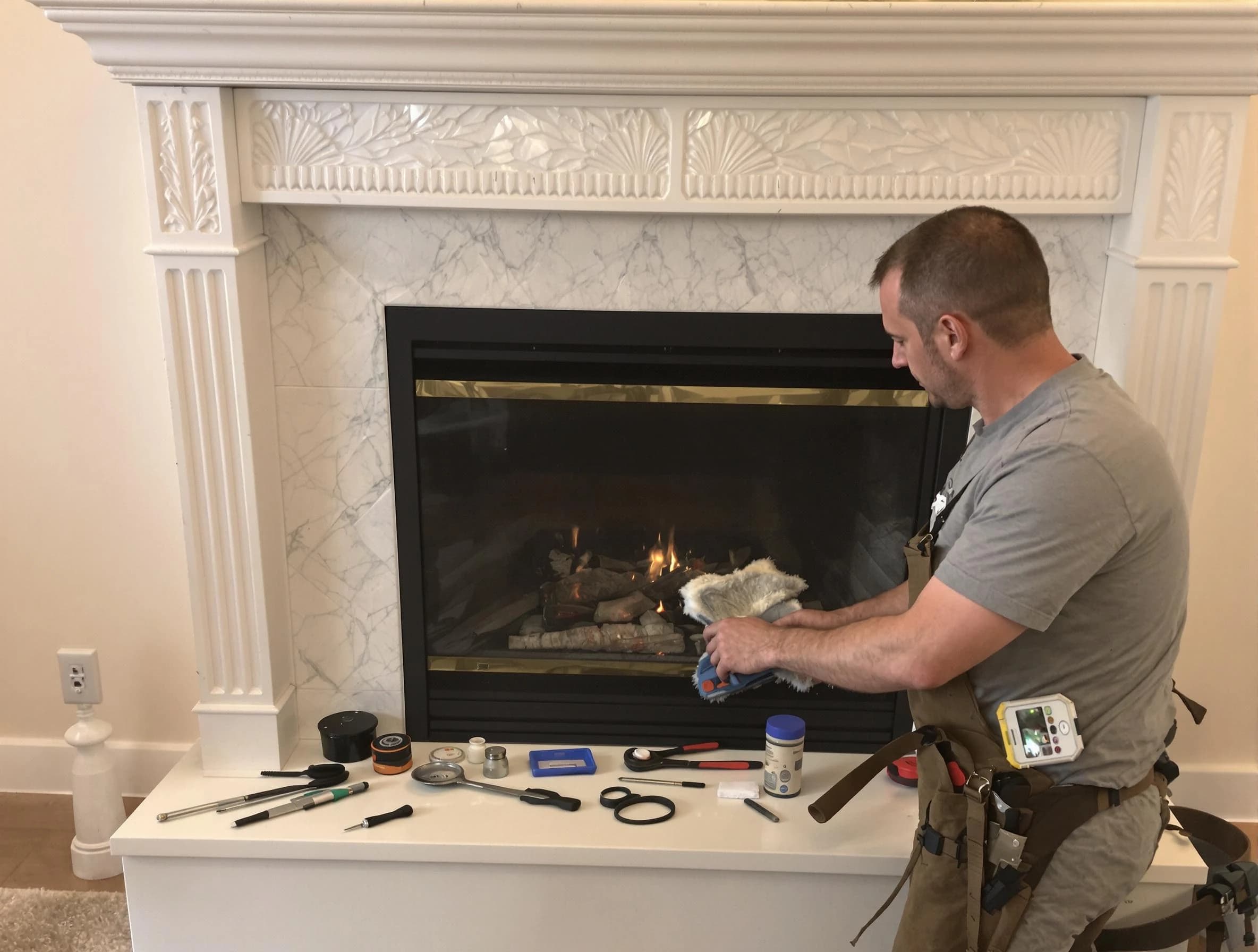 Layton Chimney Sweep performing fireplace maintenance in Layton, UT
